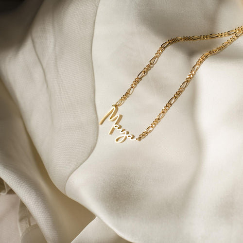 Make a Statement with the Carrie Name Necklace in Figaro Chain