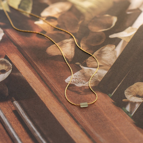 Embrace Serenity and Luck with our Green Crystal Bar Necklace