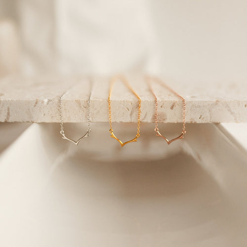 Embrace Festive Elegance with our Dainty Antler Necklace