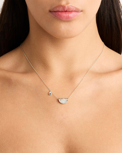 White Gold Vermeil Lotus Birthstone Necklace - December - Blue Topaz