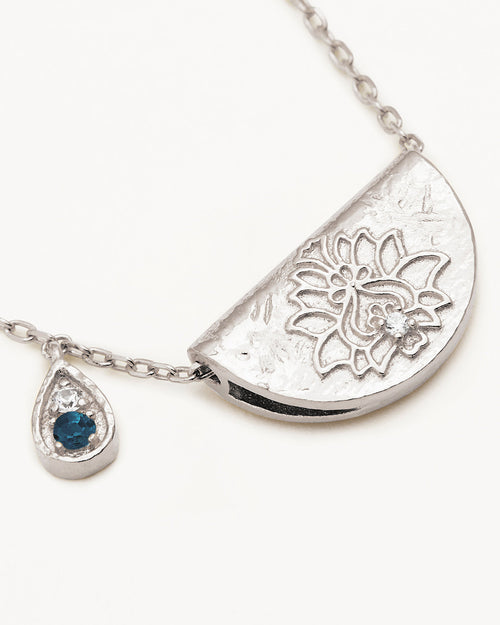 White Gold Vermeil Lotus Birthstone Necklace - December - Blue Topaz